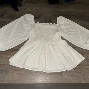 Amazon White Women's peplum top with Puff Sleeves
